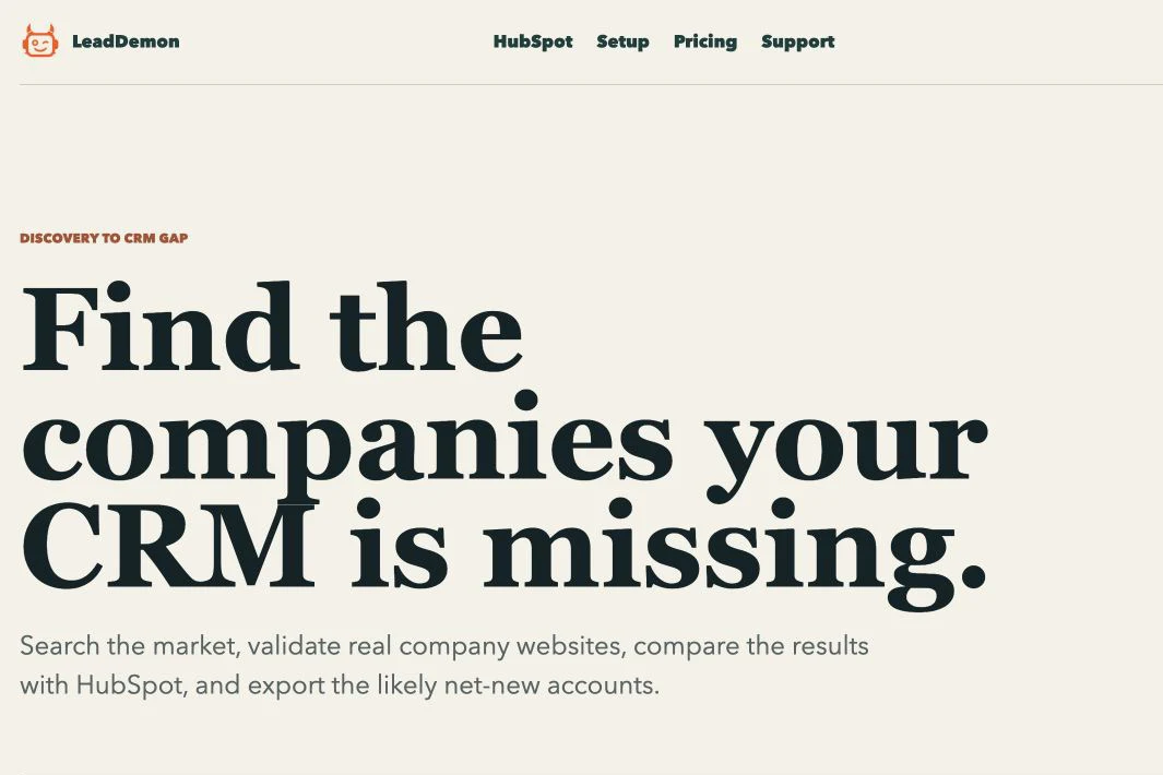 The live LeadDemon website showing its purpose: find the companies a CRM is missing by searching the market, validating websites, and comparing results with HubSpot.